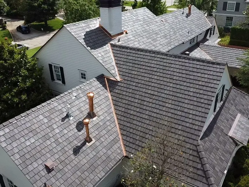 DaVinci synthetic slate roof with copper valleys and copper vent pipes