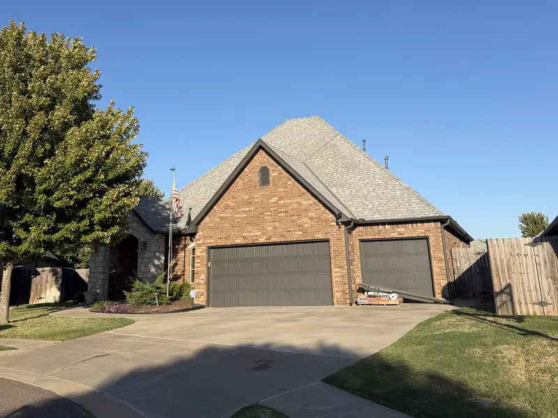 Oklahoma brick home with a new architectural shingle roof